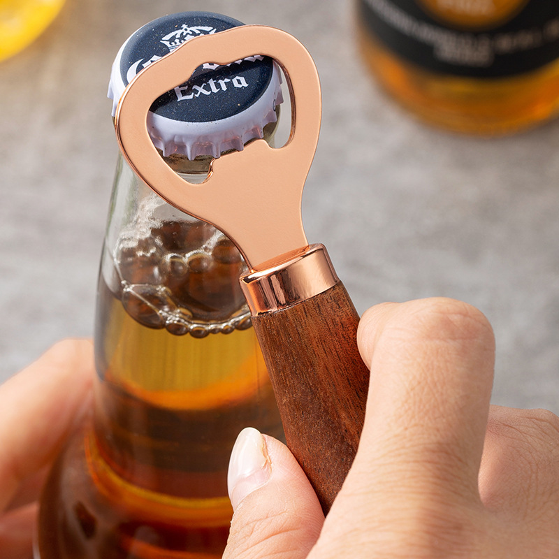 Apribottiglie per birra in acc - Woodworking Logos recensione e prezzo